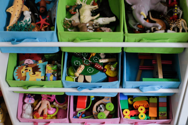 Colorful bins on shelves filled with various organized learning and Montessori toys.